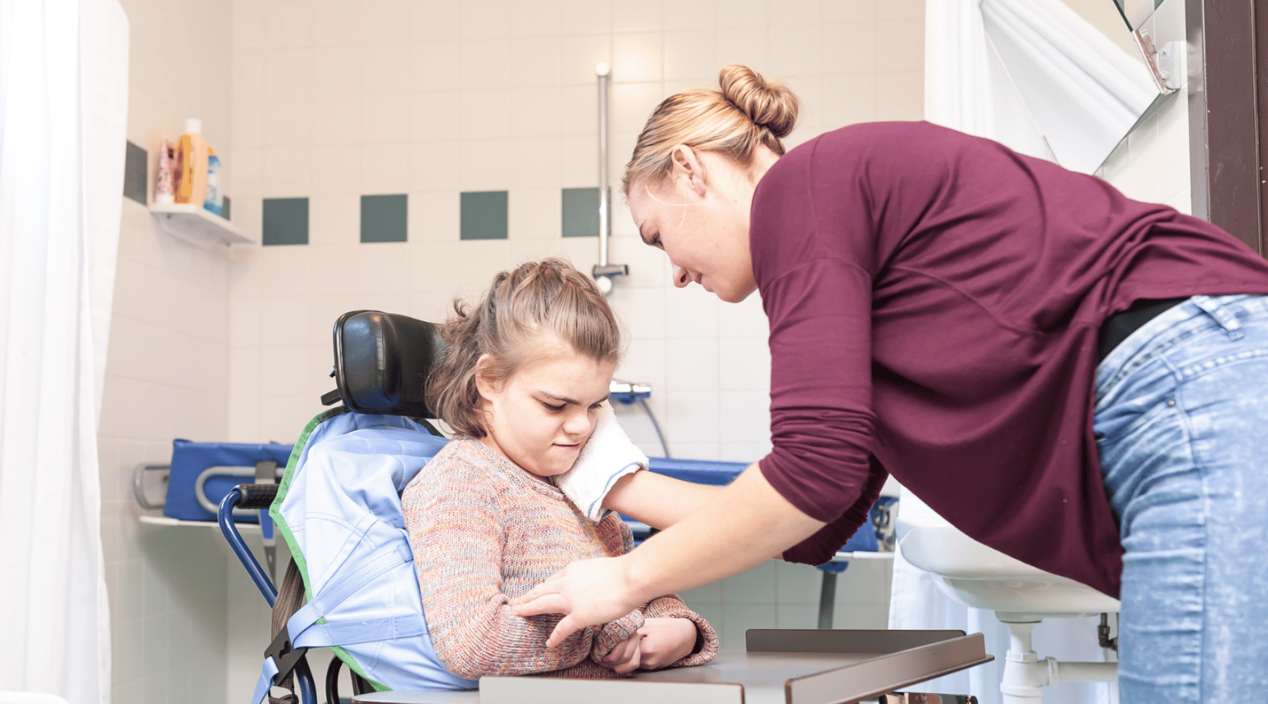 Carer looking after a person with a disability