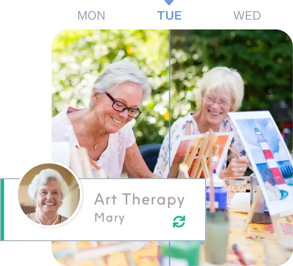 Caregiver and elderly client enjoying art therapy with watercolors, a benefit of ShiftCare holistic care.