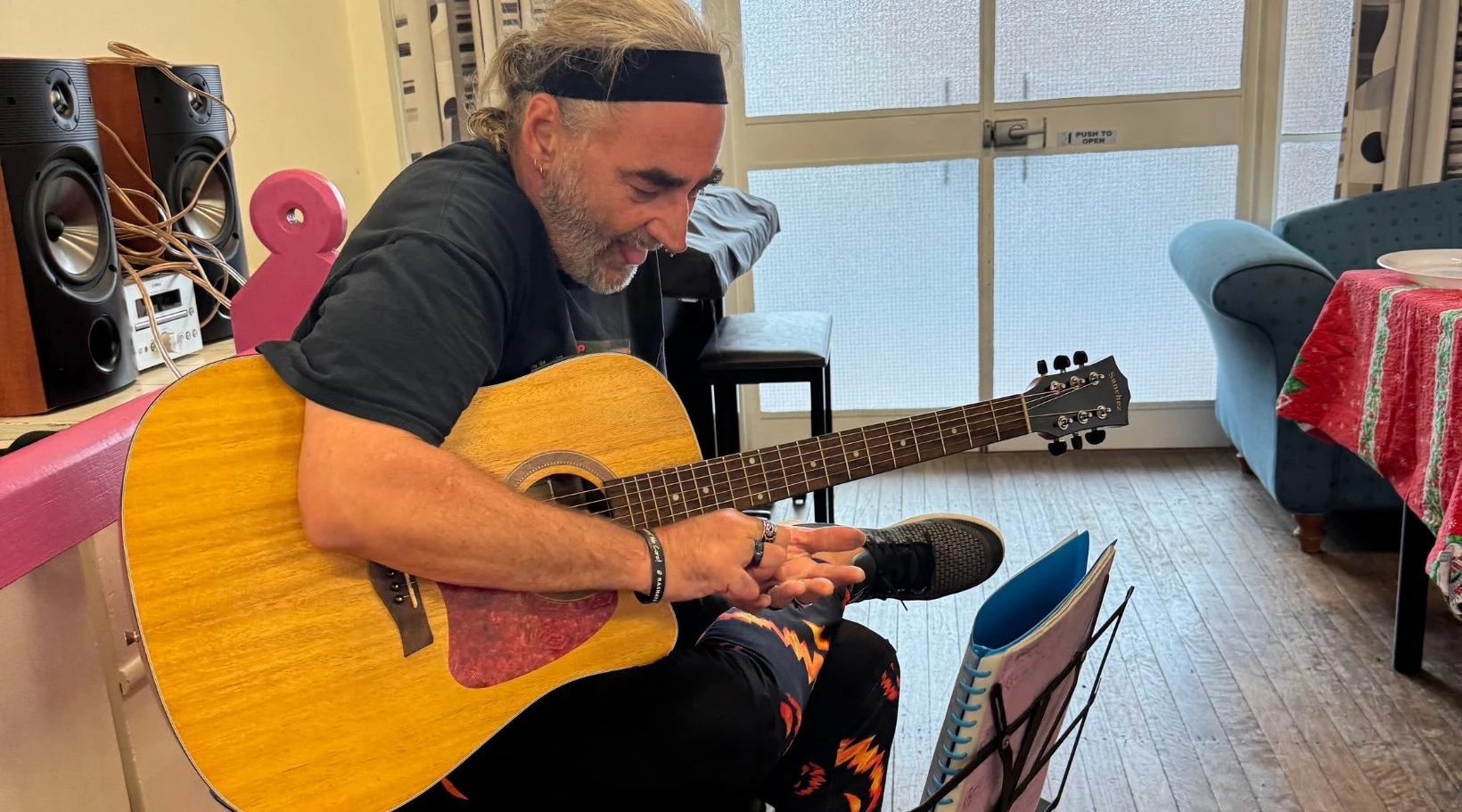Music therapy session encouraging creativity and social engagement for NDIS participants, by ShiftCare.