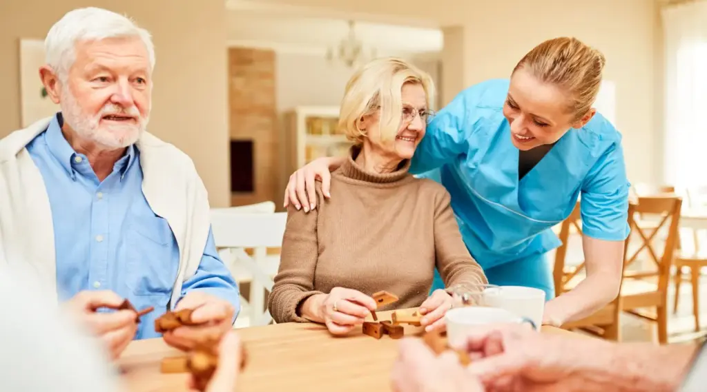 Aged care worker engaging seniors with activities to improve wellbeing using ShiftCare.