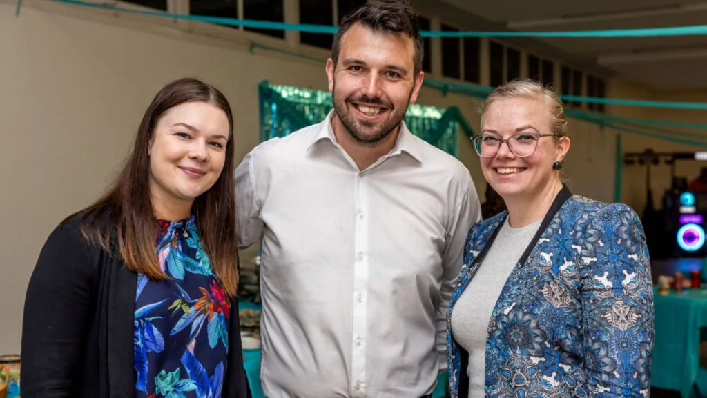 ShiftCare team celebrating partnership and success in disability support.