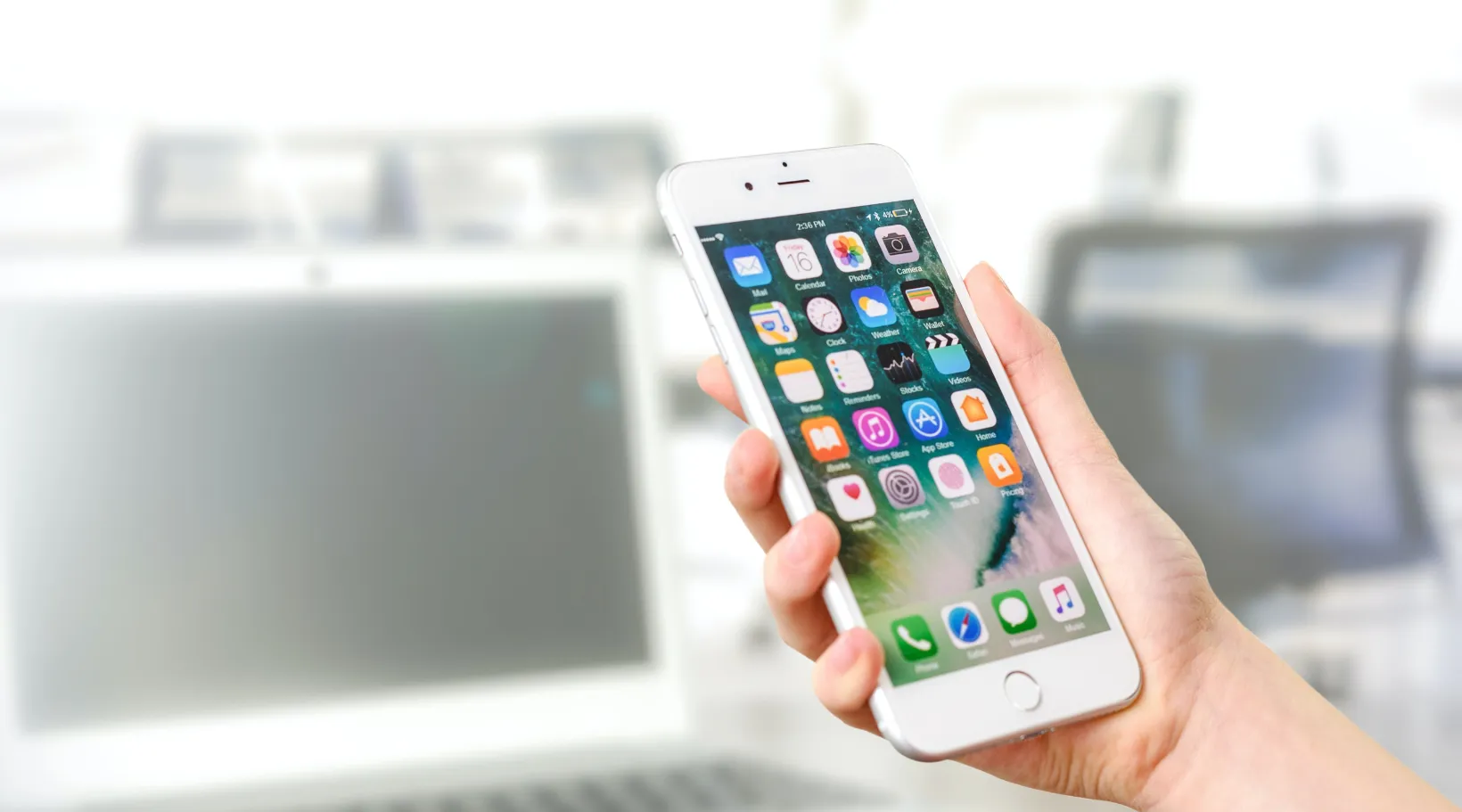 Smartphone displaying mobile interface representing ShiftCare app for caregiver scheduling and care updates.