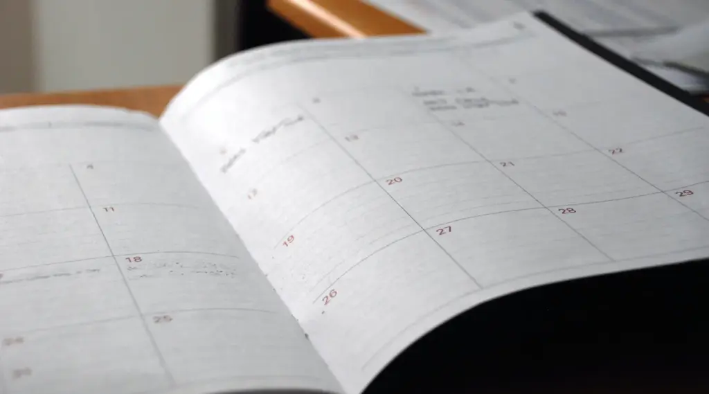 Open planner showing monthly calendar layout, representing ShiftCare’s smart scheduling system.