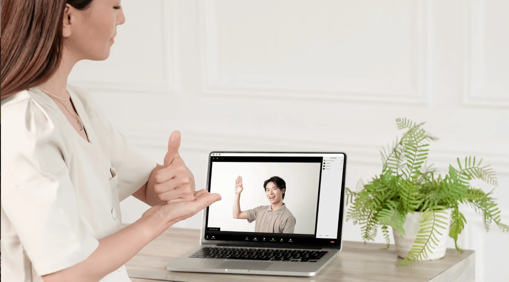 NDIS support session using sign language over video call, ShiftCare.