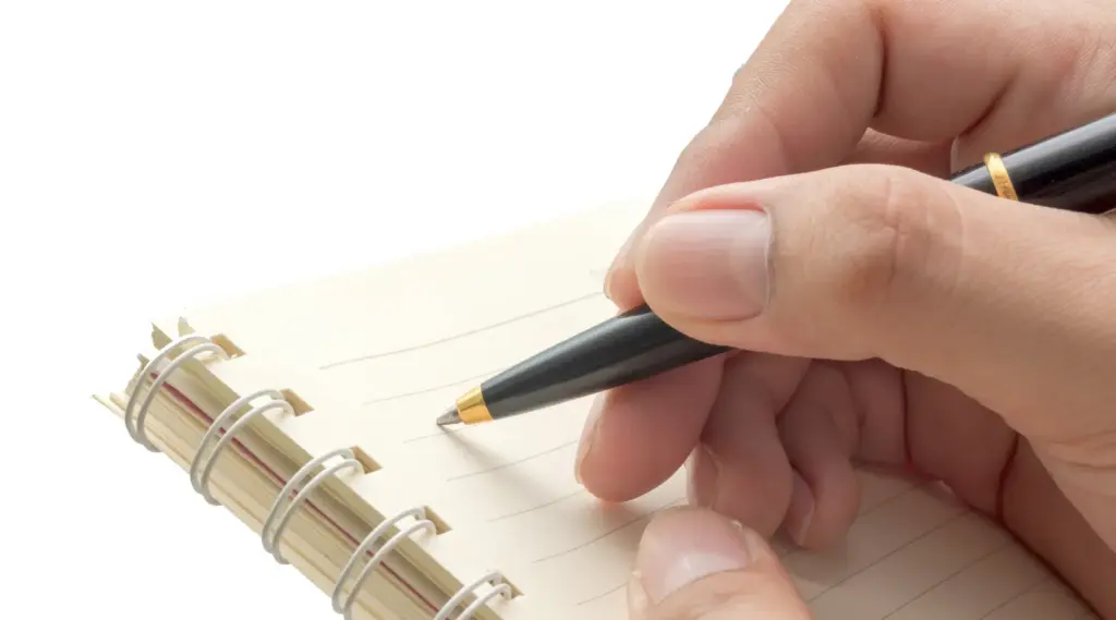 Care plan documentation and record-keeping in notebook, ShiftCare.
