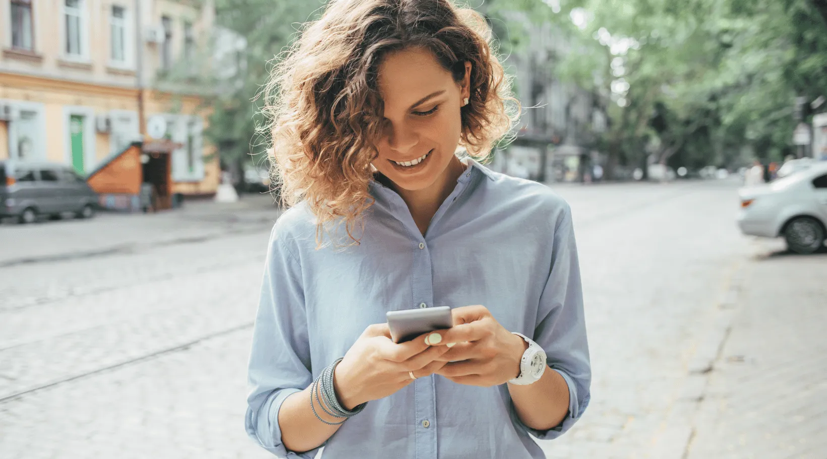 Caregiver using ShiftCare mobile app to manage shifts and communicate with clients easily.