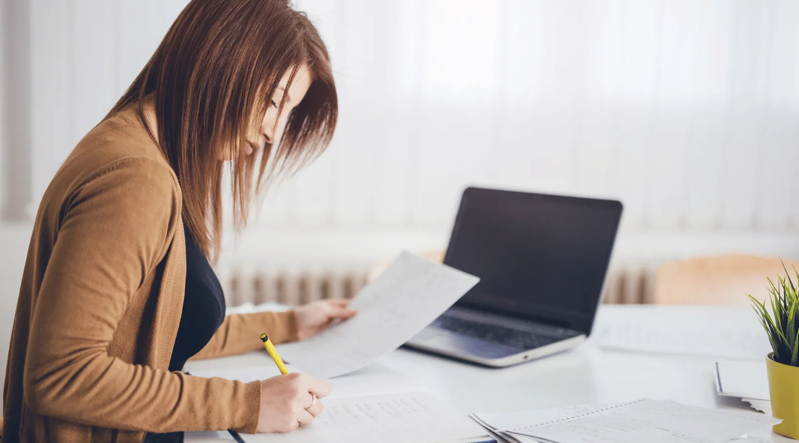 ShiftCare form for recording medication errors beside tablet and notes.