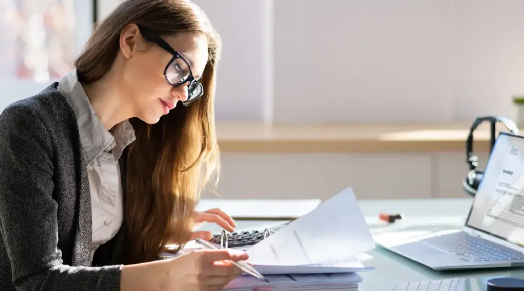 Care provider managing invoices and billing with ShiftCare software.