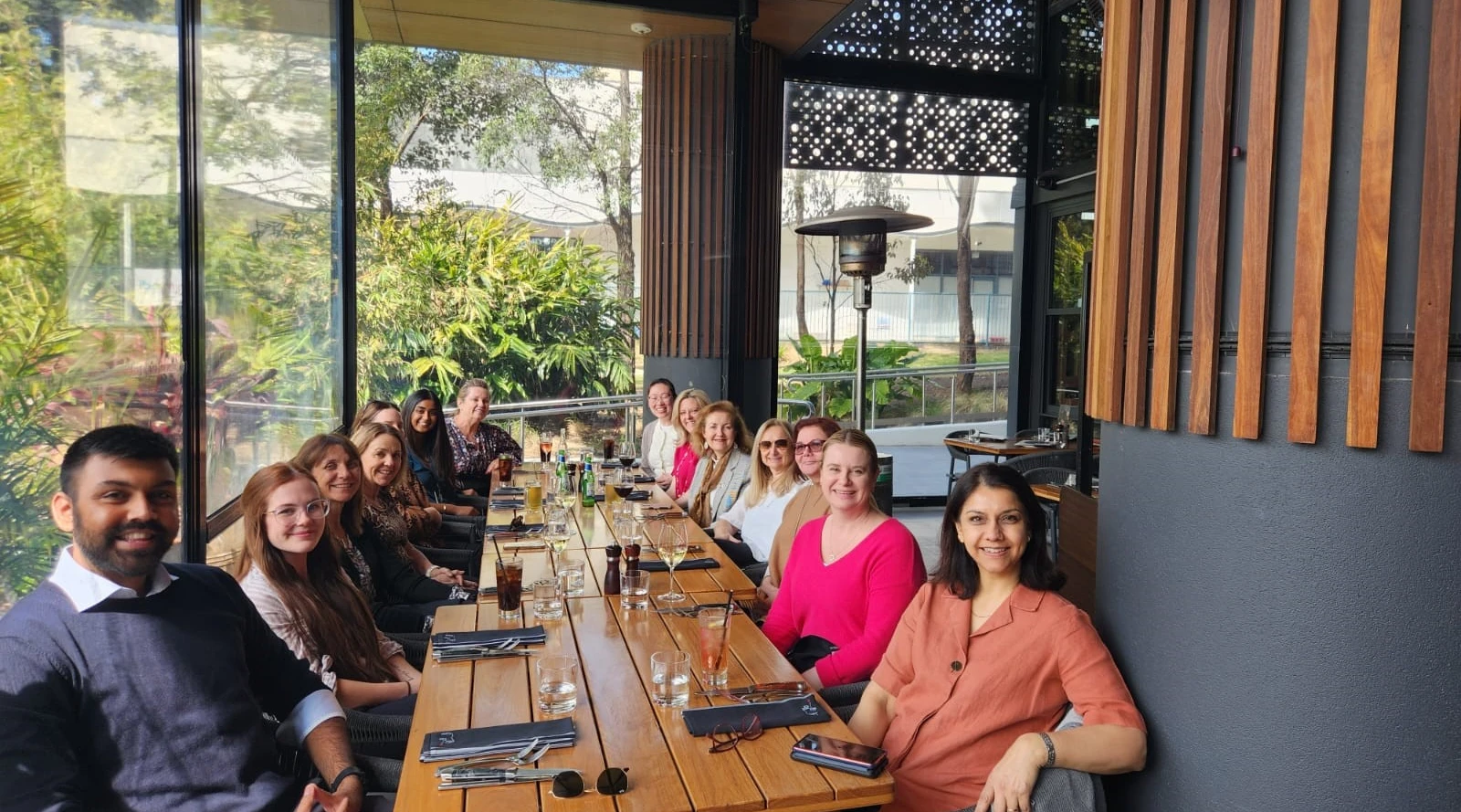 ADS Care staff lunch meeting focused on building relationships and teamwork in NDIS service delivery.