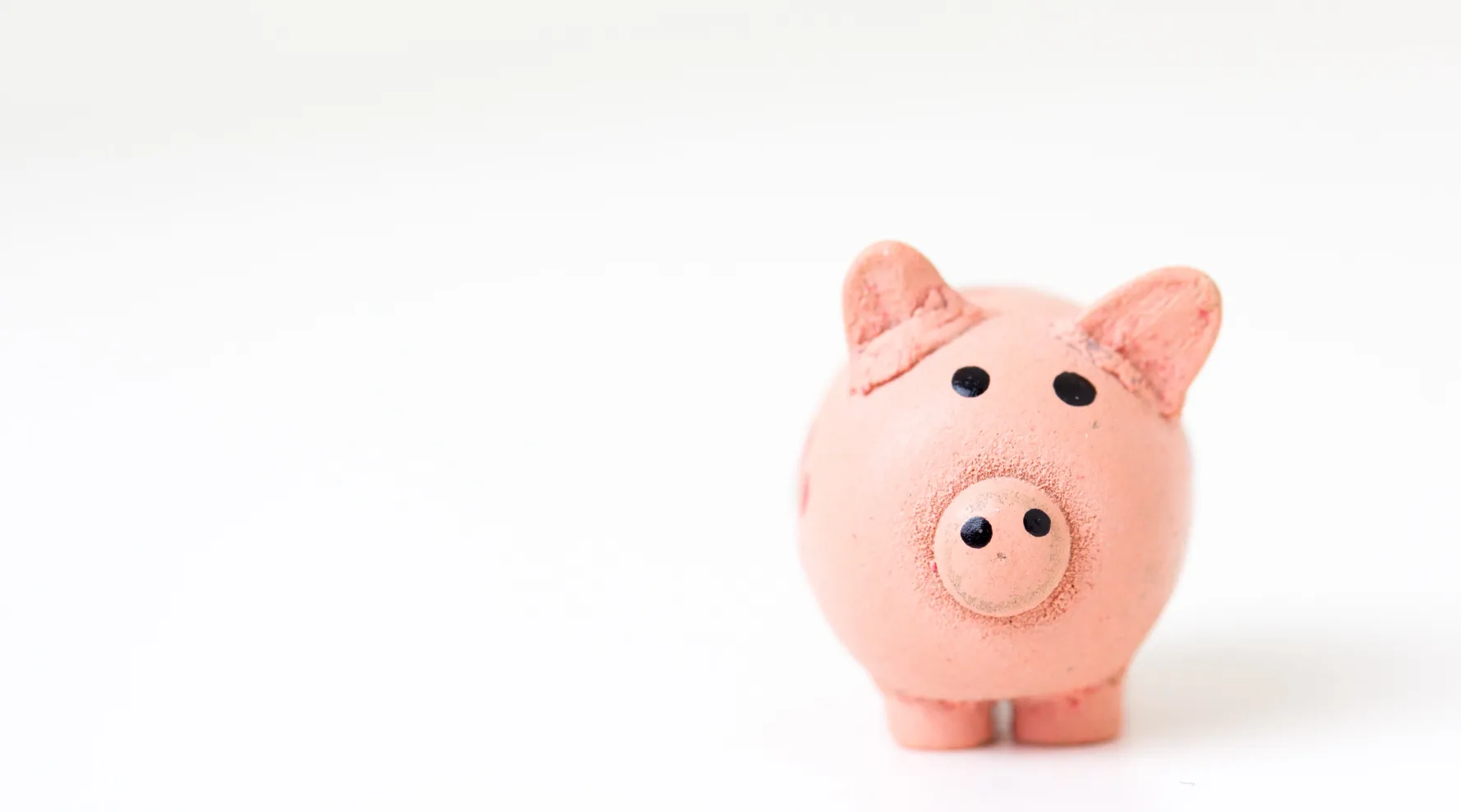 Piggy bank showing NDIS cost management concept, ShiftCare.