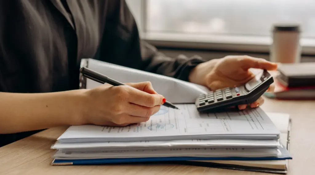 Care provider managing invoices and payroll efficiently using ShiftCare invoicing software.