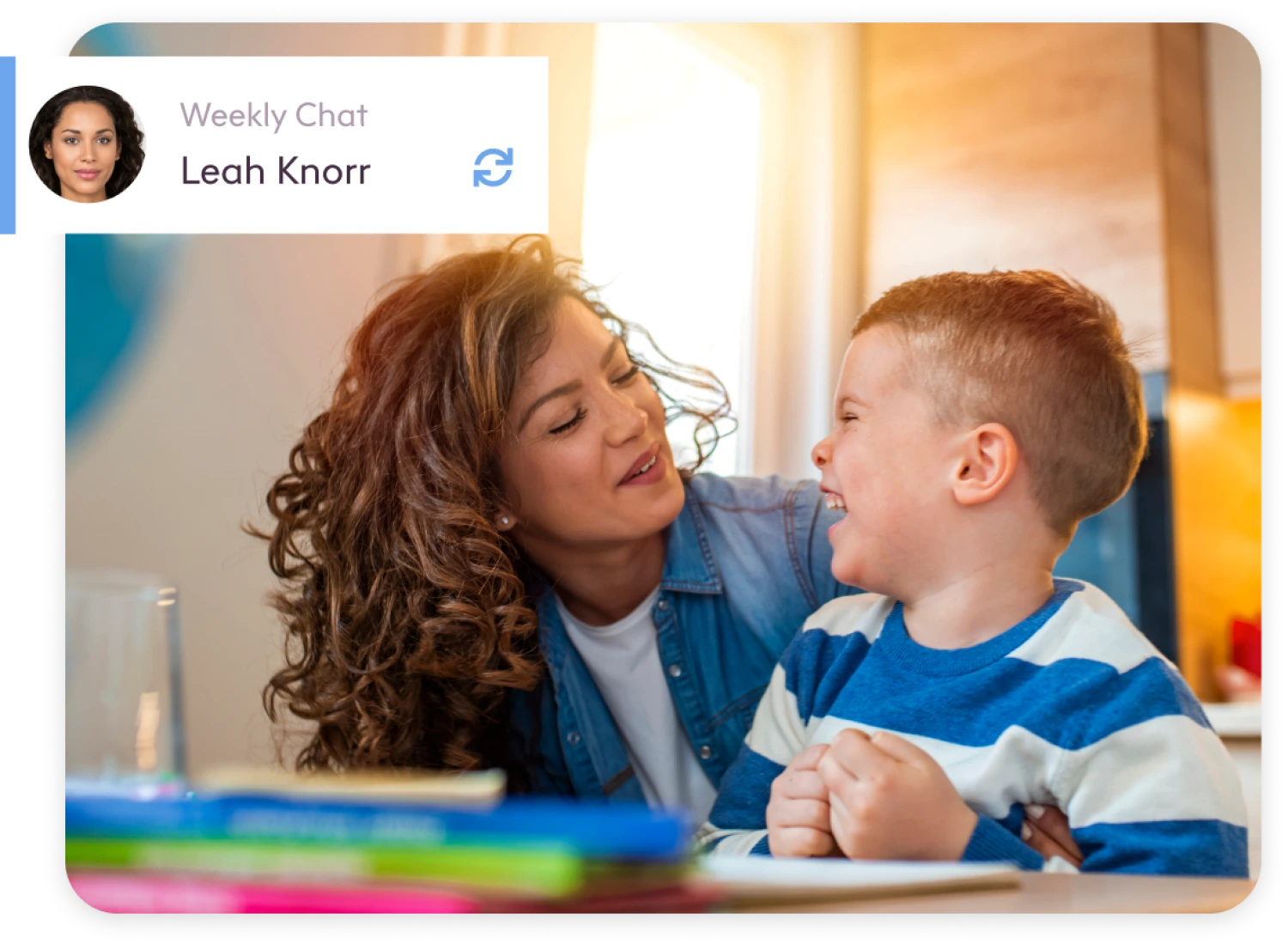 Leah Knorr, ShiftCare carer, laughs with a young client during a joyful weekly support chat.