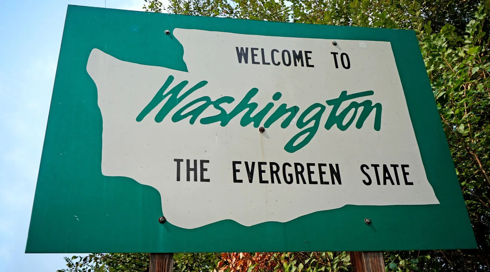 Welcome to Washington state sign representing ShiftCare’s home care services expansion in the US.
