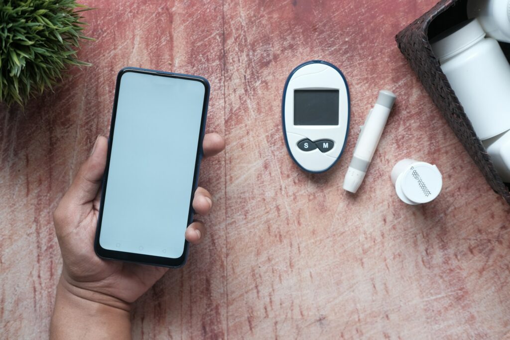 Cellphone beside a medical kit