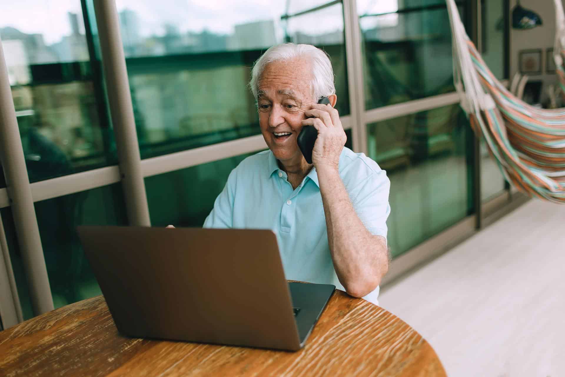 Senior using his cellphone to make a call