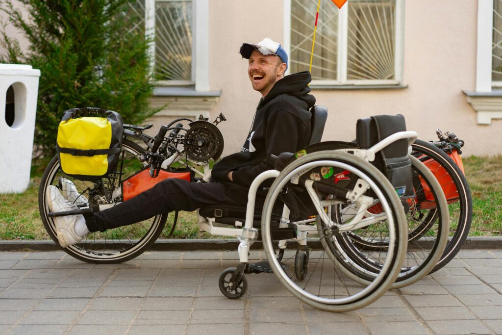 Person with disability using a modified wheelchair