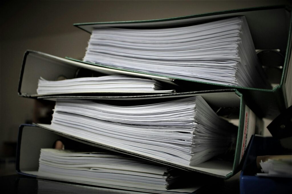 Stack of documents on a shelf