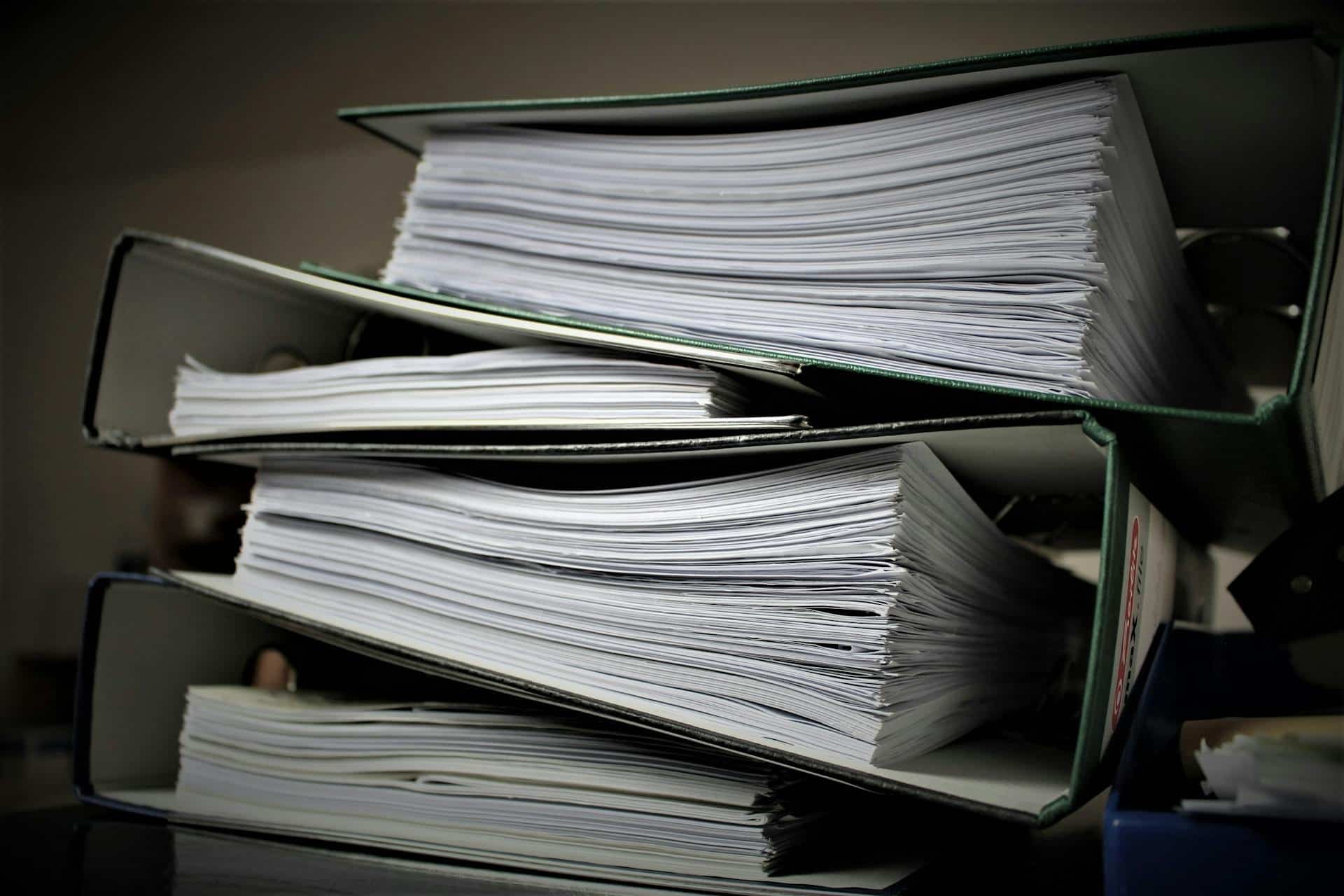 Stack of documents on a shelf