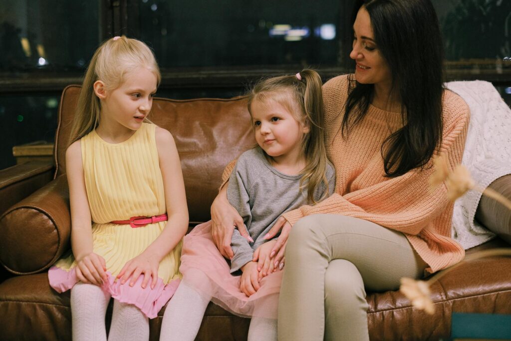 Carer looking after two little girls