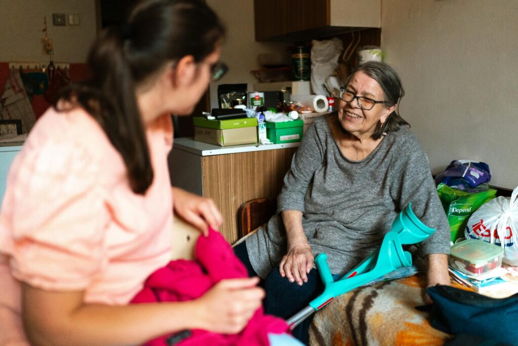 Caregiver taking care of an older patient